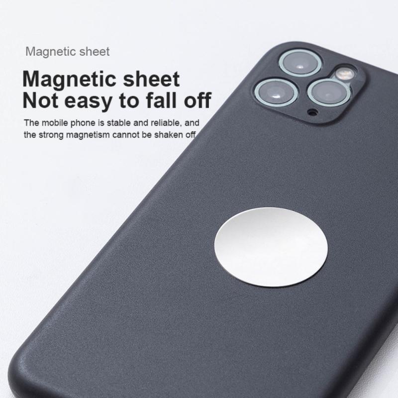 Magnetische schijf bevestigd op de achterkant van een smartphone.