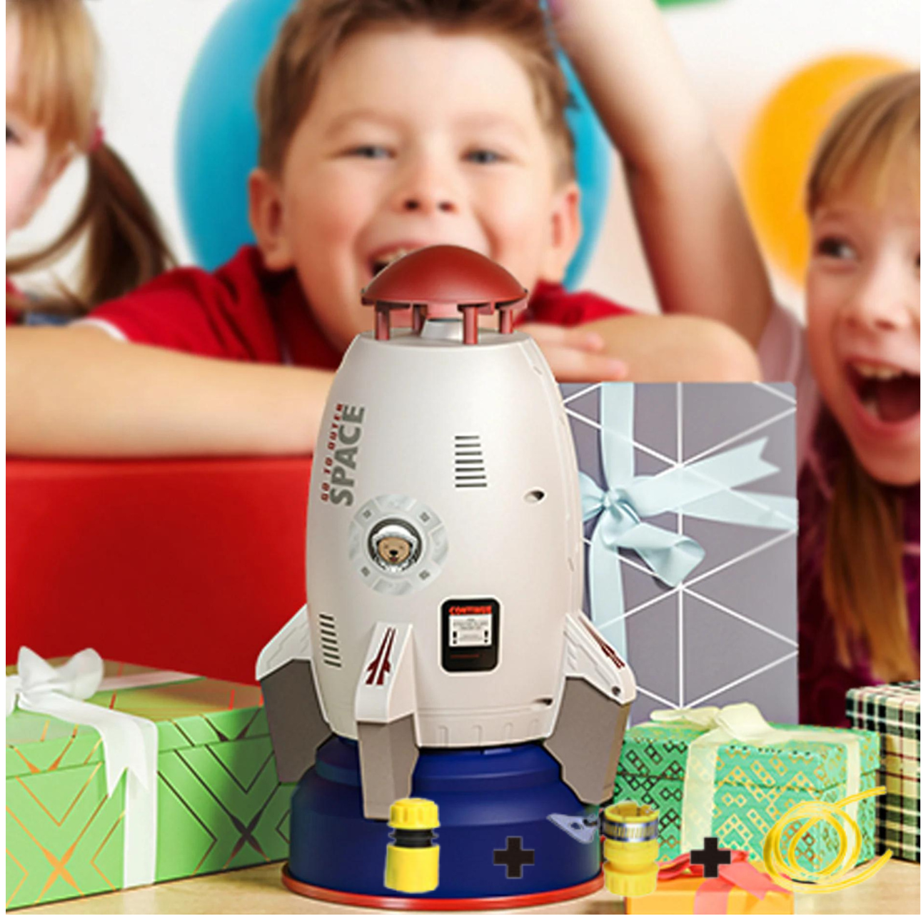 Kinderen spelen met SplashRocket bij cadeautafel